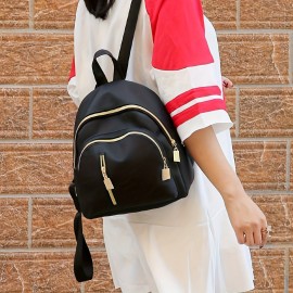 女性向けのスタイリッシュなブラックナイロンバックパック、黄色いジッパー付き、複数のコンパートメント、調節可能なショルダーストラップ - 旅行や日常の使用に最適、カジュアルなデイパック|シンプルなバックパック|安全なジッパークロージャー